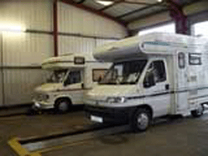 Motorhomes on inspection pit