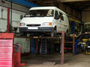 Van on a  service hoist